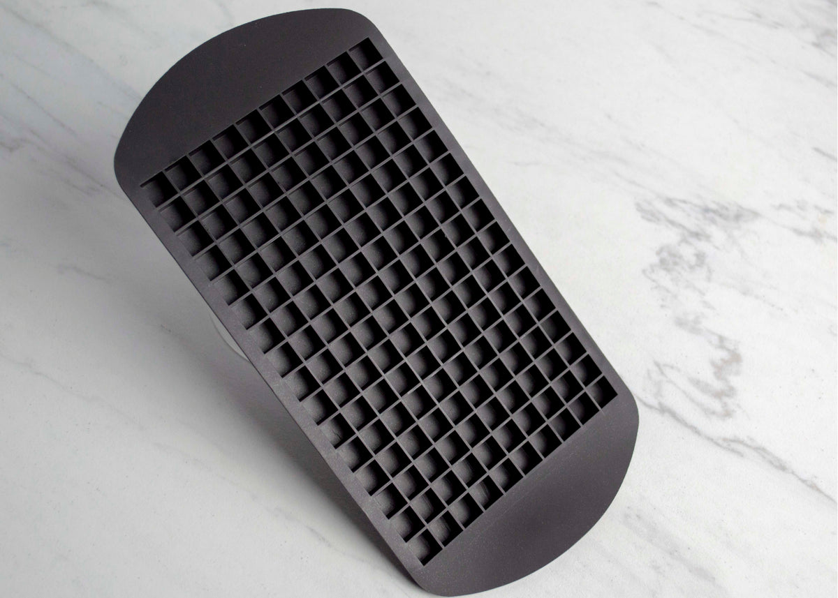Image of the black small ice tray. Ice tray is a grid of 16 by 10 cubes. Cubes are roughly 3/8" cubes.